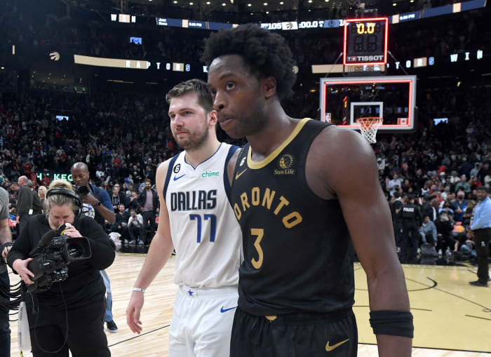 Luka Doncic and O.G. Anunoby meet at center court after a Dallas Mavericks’ game against the Toronto Raptors.